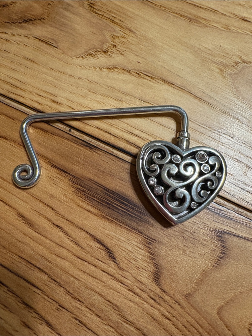 Heart-Shaped Silver Brighton Handbag Hanger with Scrollwork Accents